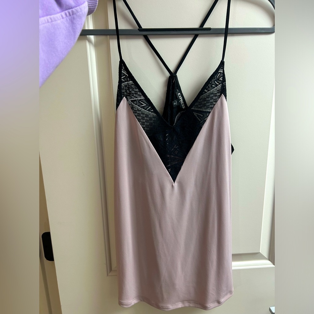 Express camisole with black lace trim. Color of tank is a light violet